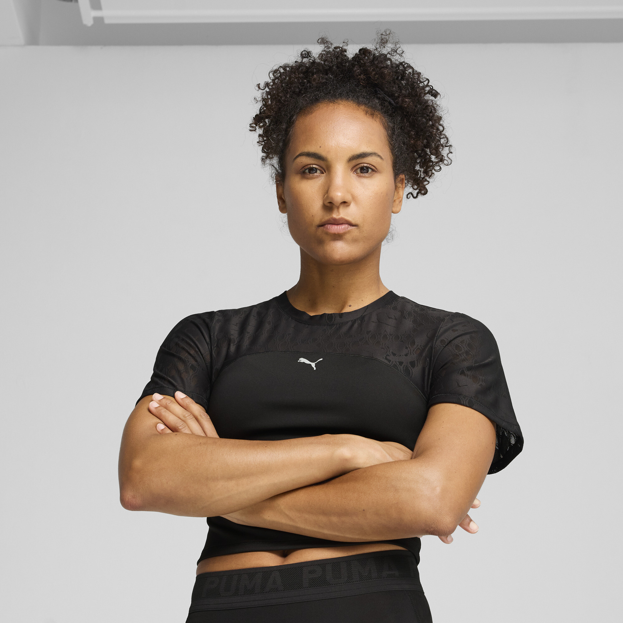 Puma ქალის მაისური LACE TOP - SHORT