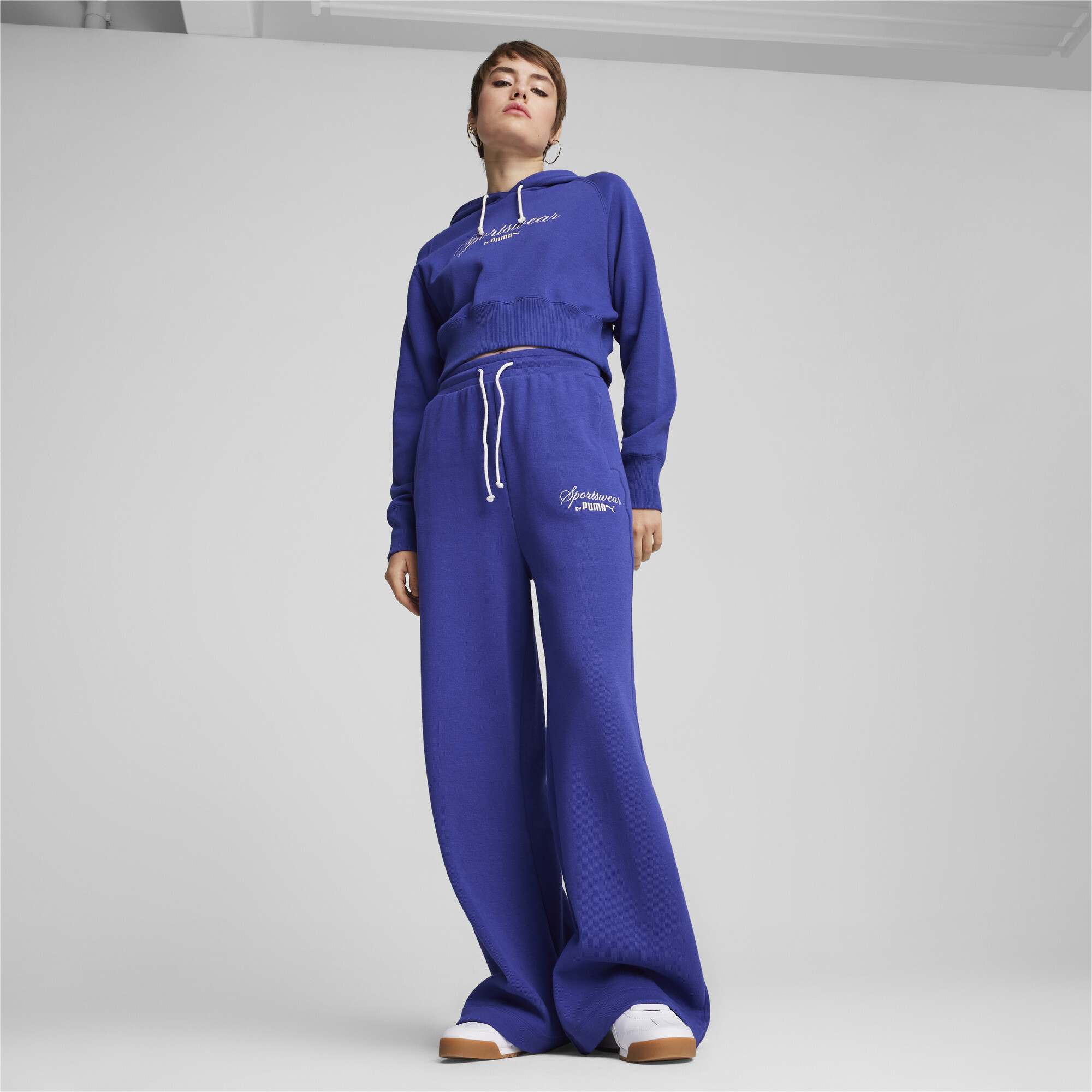 Puma ქალის ჯემპრი CLASSICS+ Relaxed Cropped Hoodie Lapis L