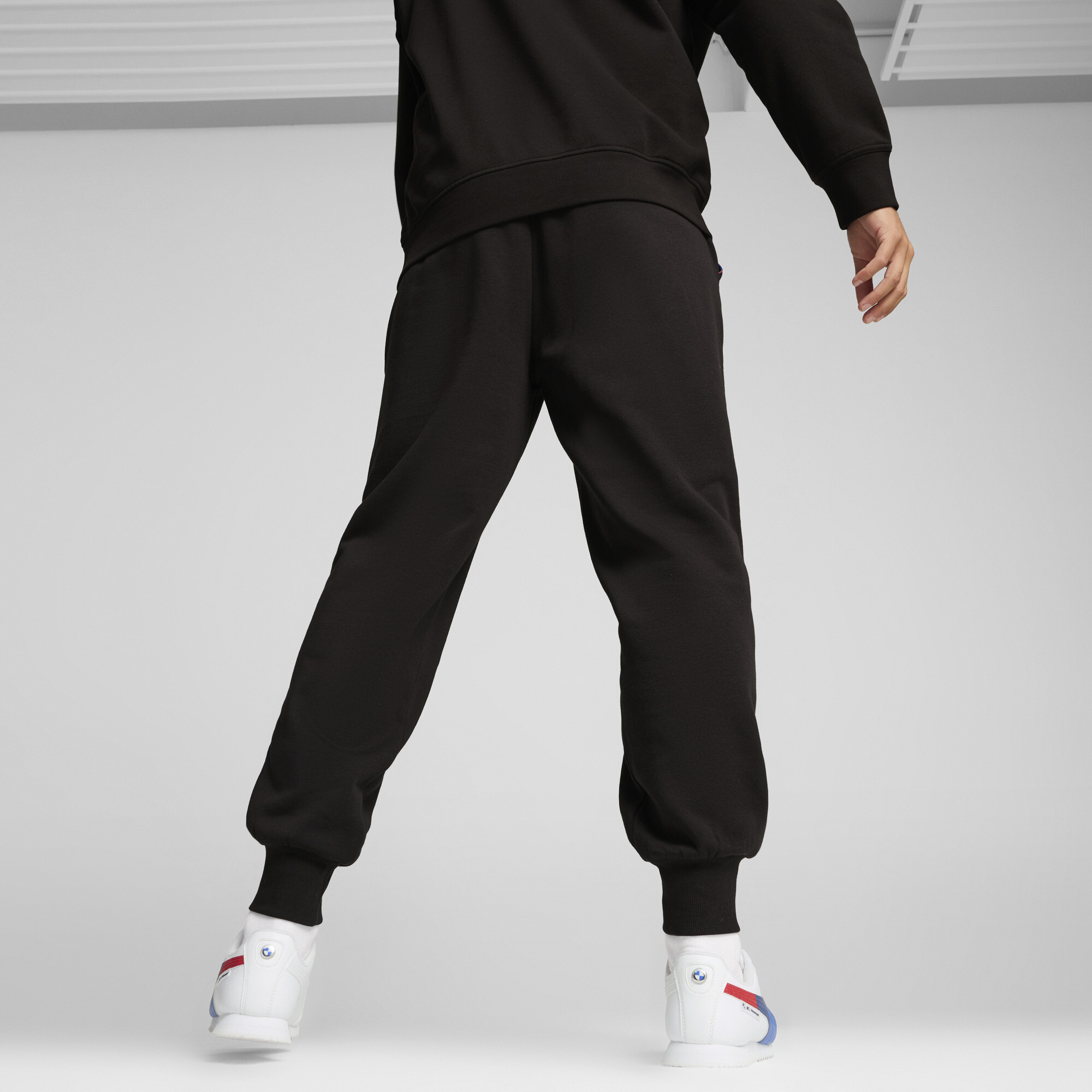 Puma შარვალი BMW MMS ESS+ PANTS FLEECE PUMA Black