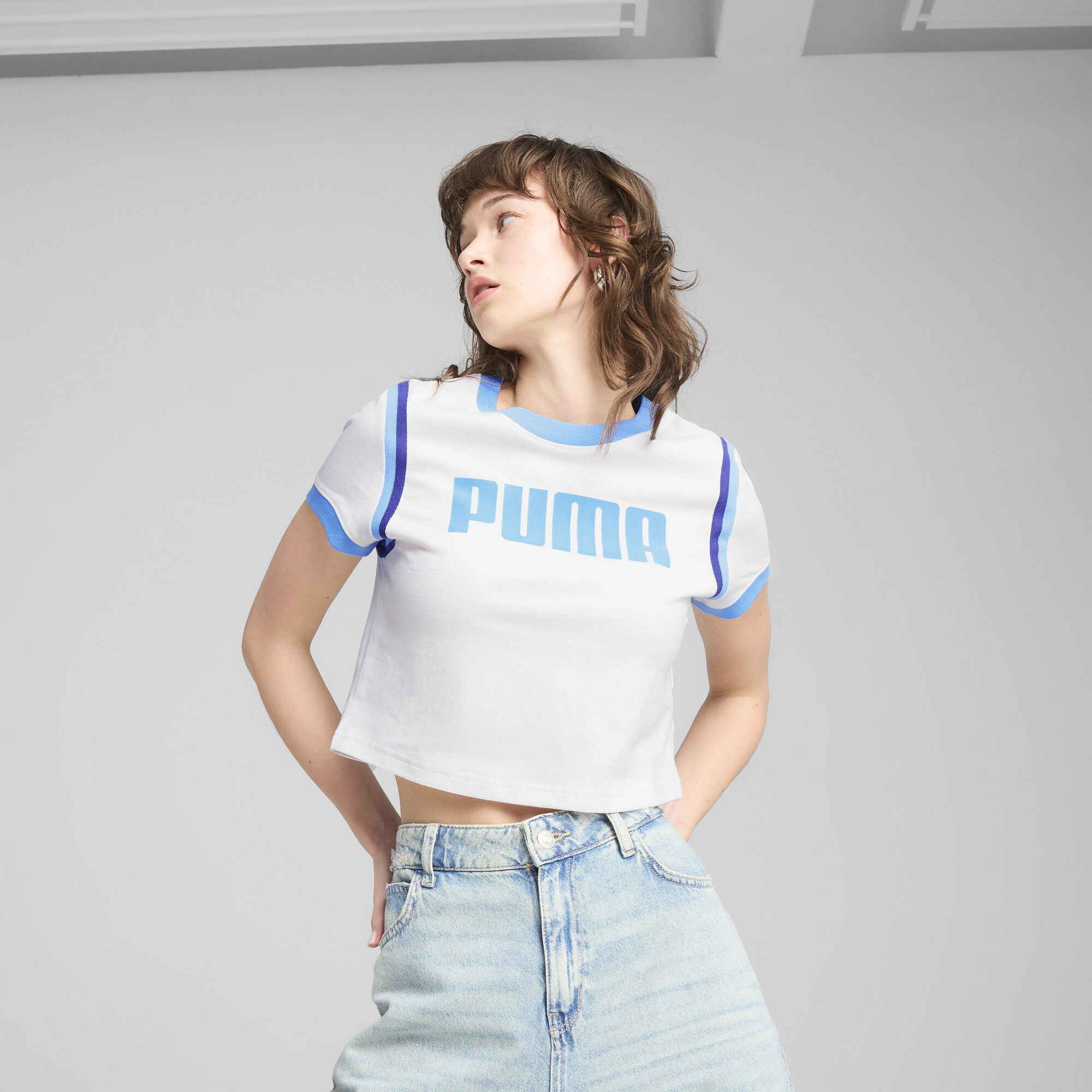 Puma ქალის მაისური FUTURE ARCHIVE Graphic Baby Tee