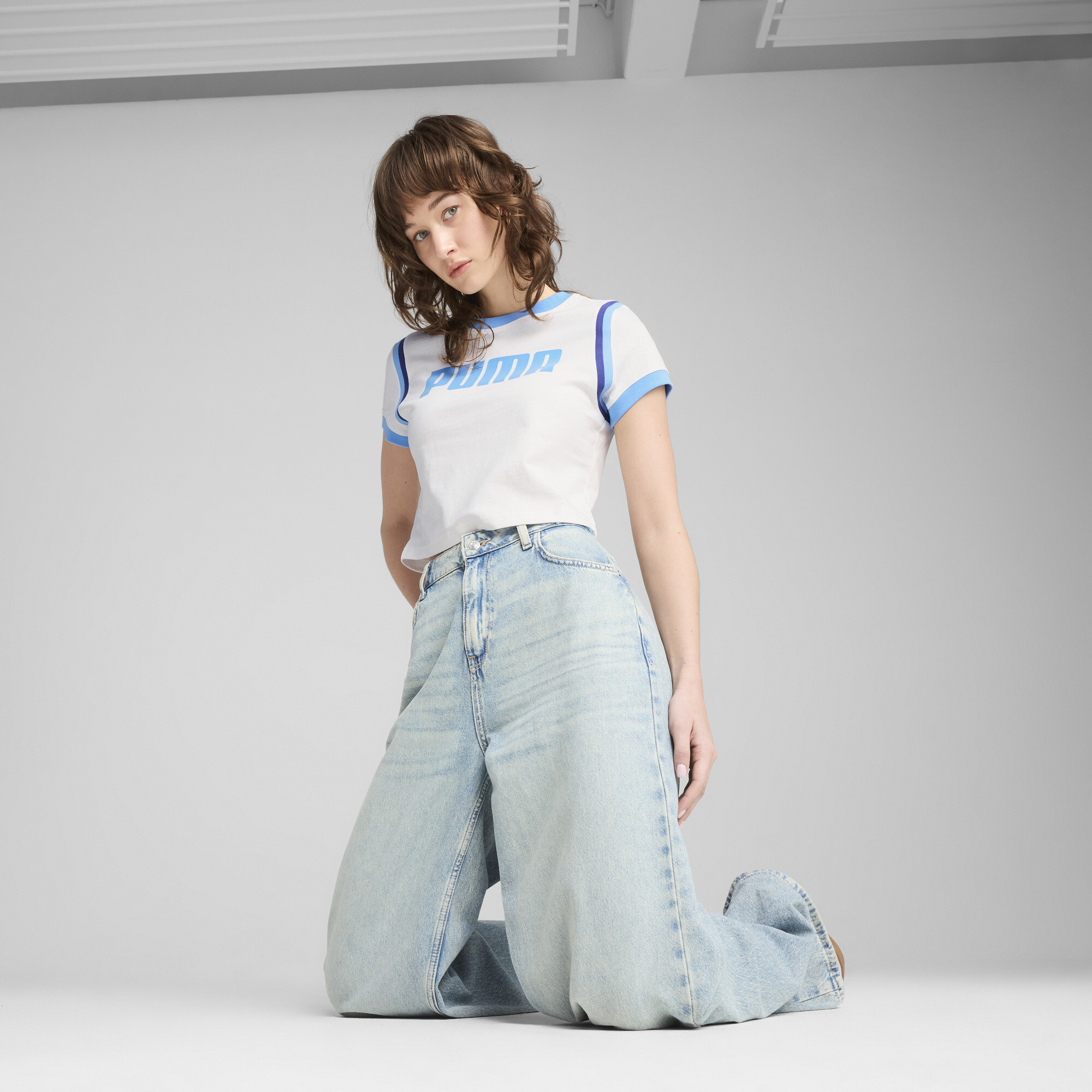 Puma ქალის მაისური FUTURE ARCHIVE Graphic Baby Tee