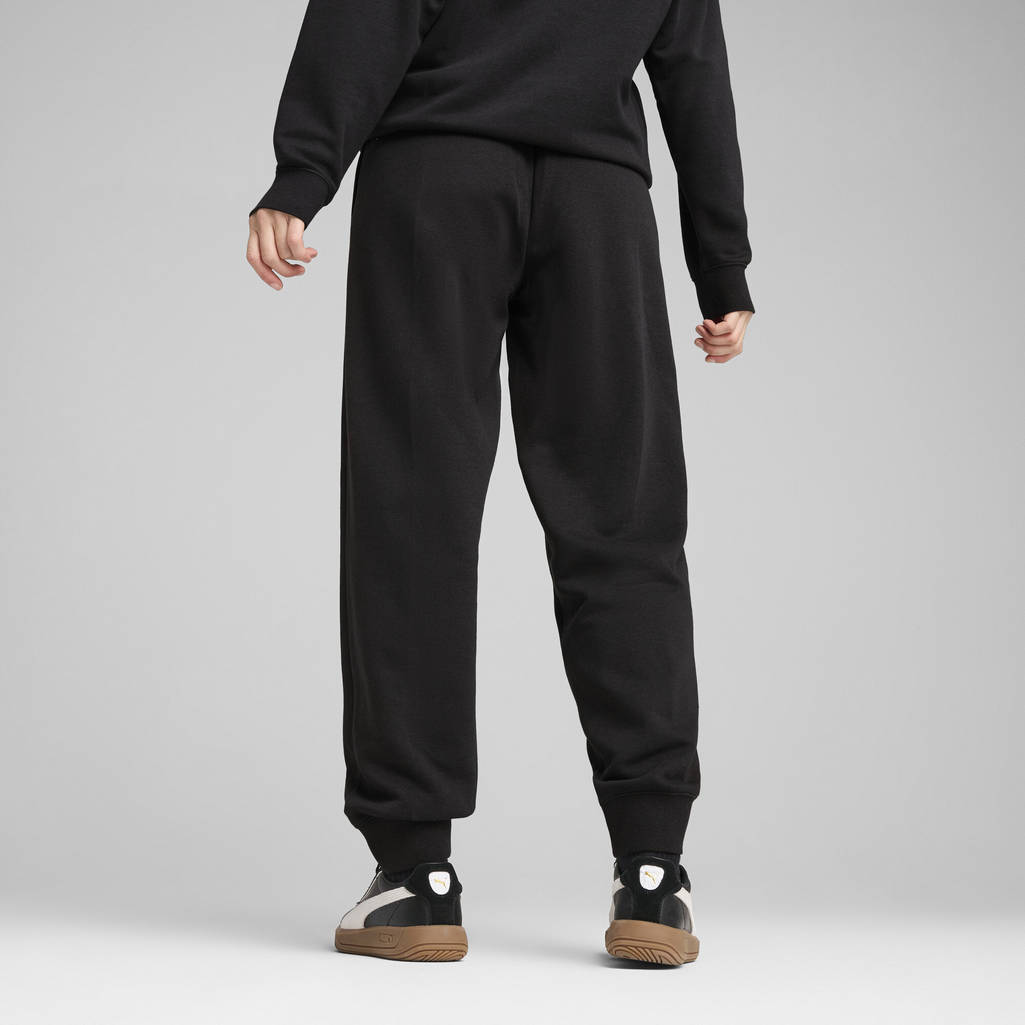 Puma ქალის შარვალი ESS SCRIPT Sweatpants TR cl