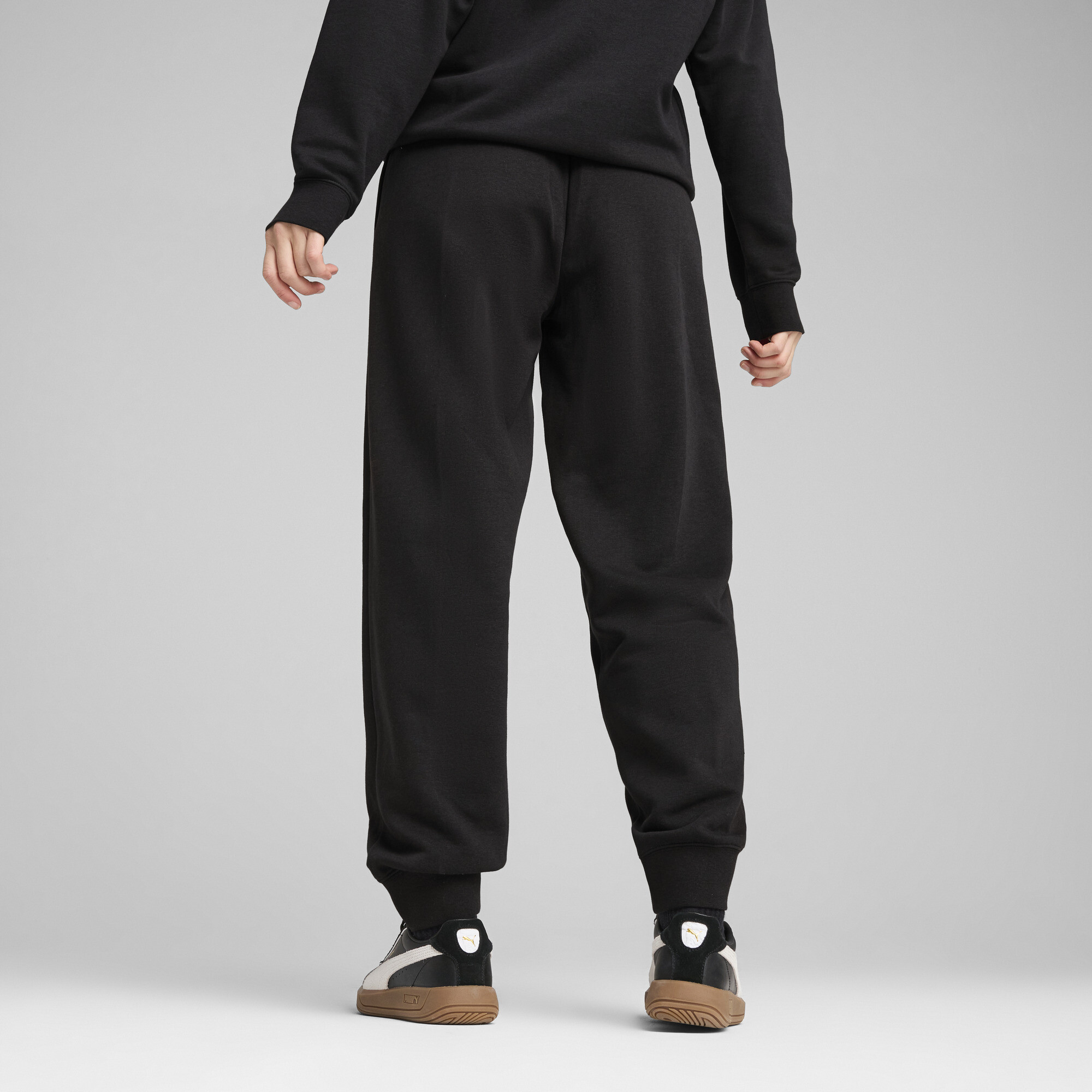 Puma ქალის შარვალი ESS SCRIPT Sweatpants TR cl