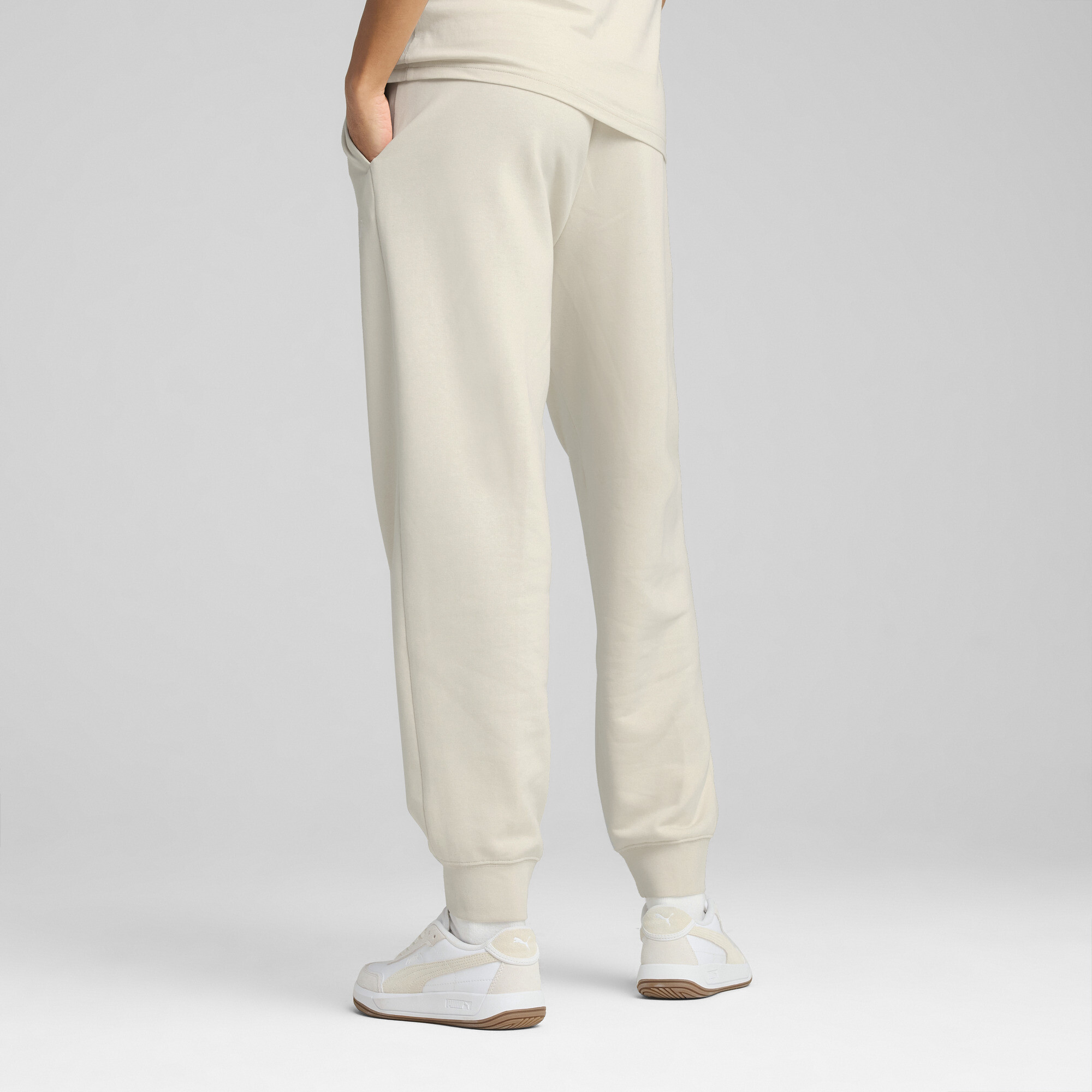 Puma ქალის შარვალი ESS SCRIPT Sweatpants TR cl
