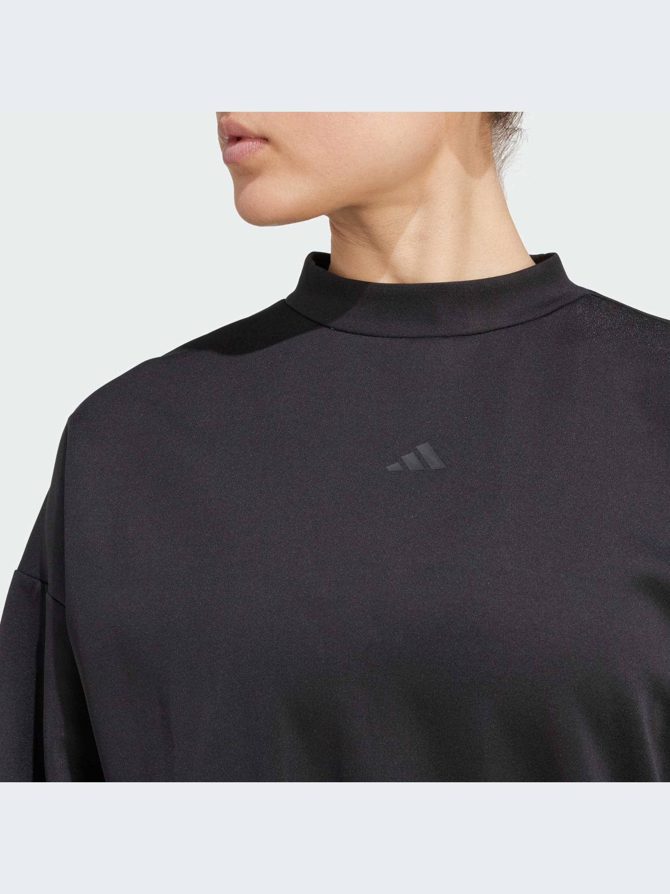 Adidas ქალის ჯემპრი MOTION ES COVER