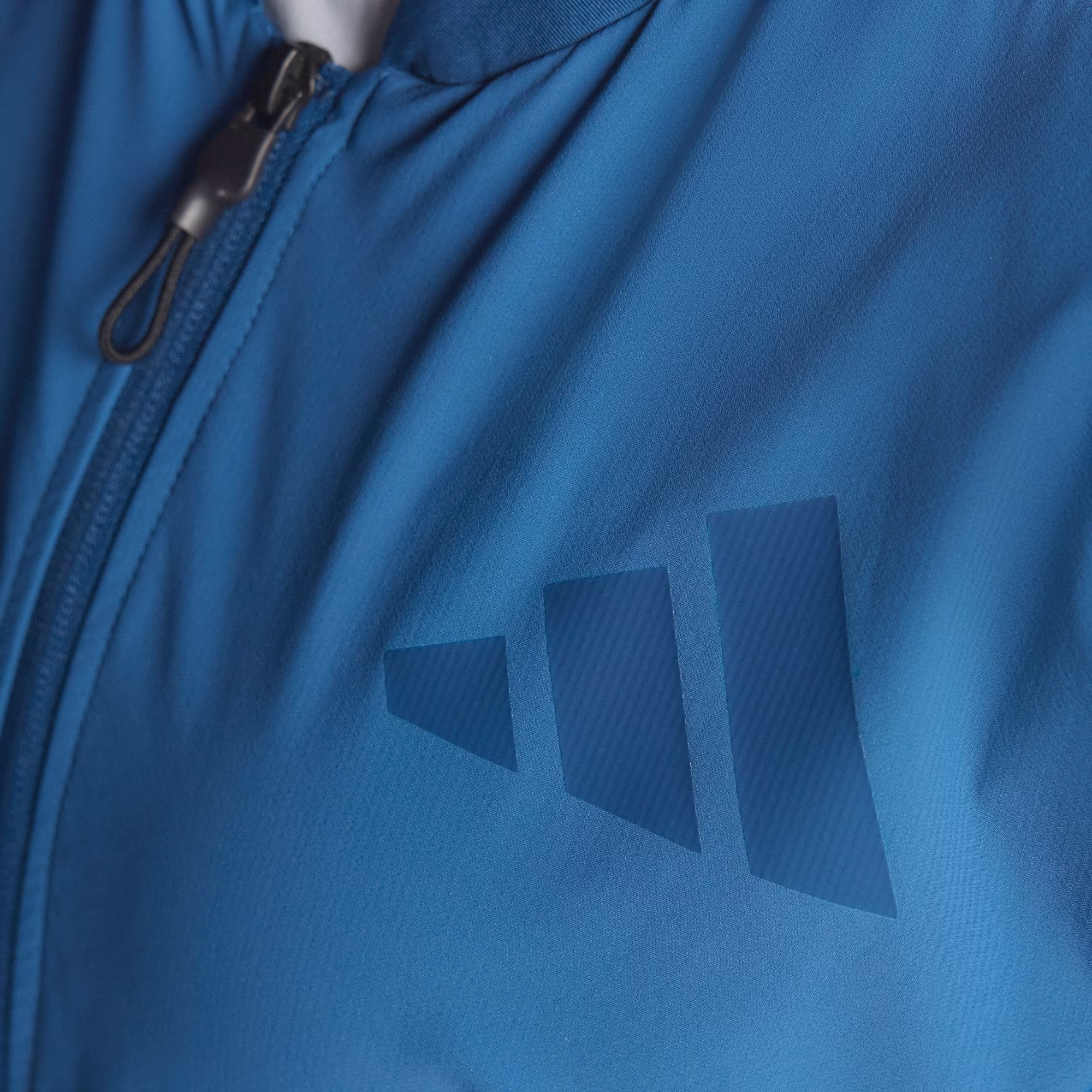 Adidas ქალის  ქურთუკი W Z.N.E. WV BOM